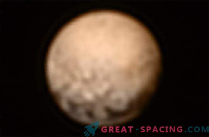 La nave rianimata della missione New Horizons invia una foto di Pluto