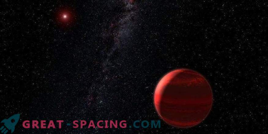 Una nana rossa nascosta nella polvere di una stella gigante