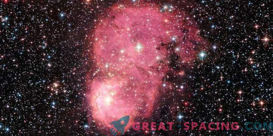 Nebulosa galattica incandescente festosa per Hubble