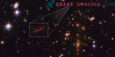 Hubble e Spitzer sono combinati per ottenere un'immagine migliorata di una galassia lontana